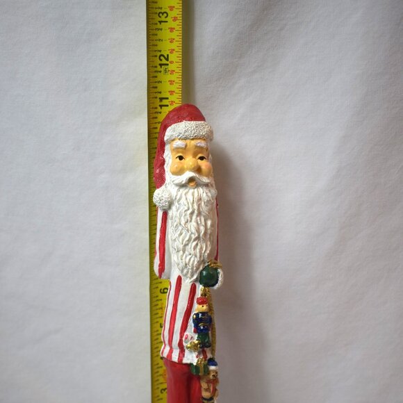 Vintage Resin Skinny Santa Claus Figure With Black Boots and Toys - Picture 9 of 11